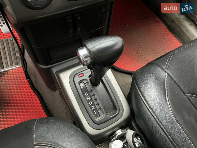 Красный Ниссан ИксТрейл, объемом двигателя 2.49 л и пробегом 298 тыс. км за 5999 $, фото 11 на Automoto.ua