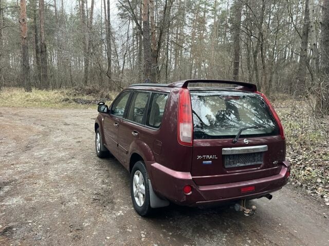 Красный Ниссан ИксТрейл, объемом двигателя 2.2 л и пробегом 160 тыс. км за 5000 $, фото 7 на Automoto.ua