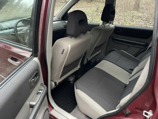 Красный Ниссан ИксТрейл, объемом двигателя 2.2 л и пробегом 160 тыс. км за 5000 $, фото 8 на Automoto.ua