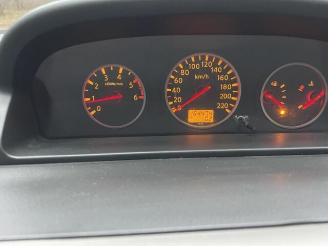 Красный Ниссан ИксТрейл, объемом двигателя 2.2 л и пробегом 160 тыс. км за 5000 $, фото 14 на Automoto.ua