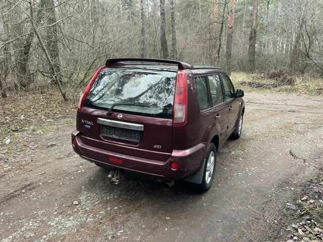 Красный Ниссан ИксТрейл, объемом двигателя 2.2 л и пробегом 160 тыс. км за 5000 $, фото 5 на Automoto.ua