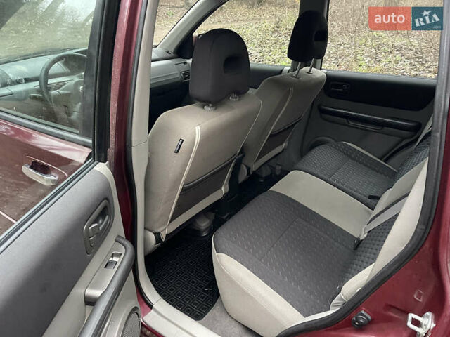 Красный Ниссан ИксТрейл, объемом двигателя 2.2 л и пробегом 160 тыс. км за 5000 $, фото 12 на Automoto.ua