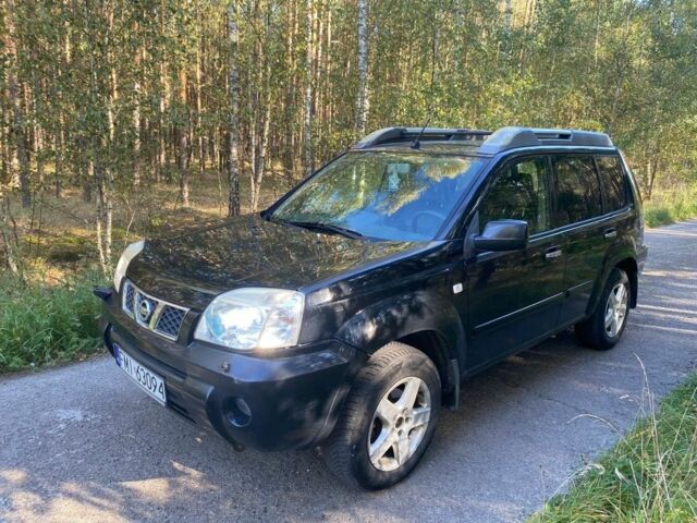 Красный Ниссан ИксТрейл, объемом двигателя 2.2 л и пробегом 335 тыс. км за 5008 $, фото 1 на Automoto.ua