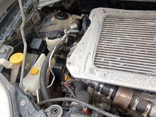 Красный Ниссан ИксТрейл, объемом двигателя 2.2 л и пробегом 335 тыс. км за 5008 $, фото 8 на Automoto.ua