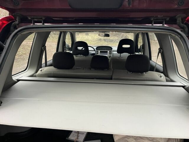 Красный Ниссан ИксТрейл, объемом двигателя 2.2 л и пробегом 160 тыс. км за 5000 $, фото 10 на Automoto.ua