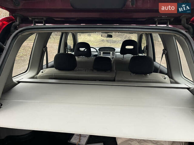 Красный Ниссан ИксТрейл, объемом двигателя 2.2 л и пробегом 160 тыс. км за 5000 $, фото 9 на Automoto.ua