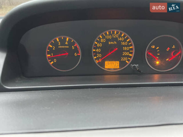 Красный Ниссан ИксТрейл, объемом двигателя 2.2 л и пробегом 160 тыс. км за 5000 $, фото 14 на Automoto.ua