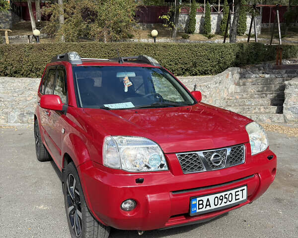 Червоний Ніссан ІксТрейл, об'ємом двигуна 2.49 л та пробігом 140 тис. км за 6900 $, фото 4 на Automoto.ua