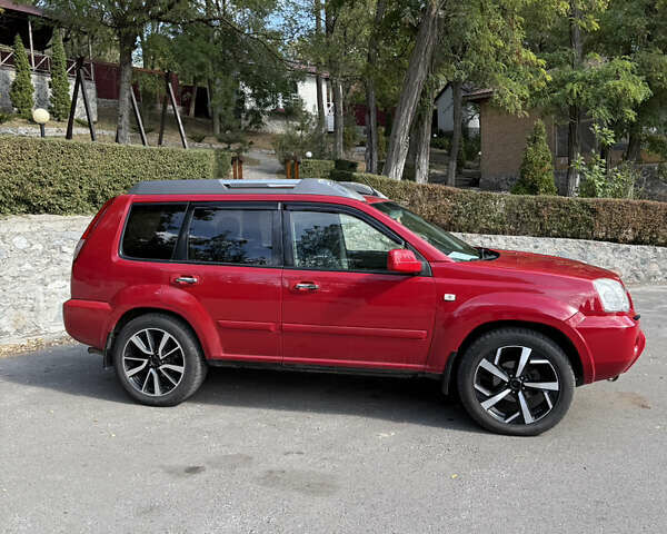 Червоний Ніссан ІксТрейл, об'ємом двигуна 2.49 л та пробігом 140 тис. км за 6900 $, фото 3 на Automoto.ua