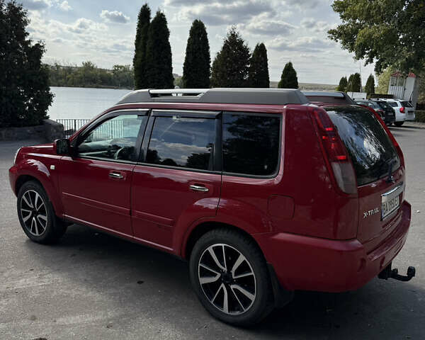 Червоний Ніссан ІксТрейл, об'ємом двигуна 2.49 л та пробігом 140 тис. км за 6900 $, фото 11 на Automoto.ua