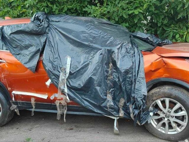 Красный Ниссан ИксТрейл, объемом двигателя 2.5 л и пробегом 70 тыс. км за 8300 $, фото 7 на Automoto.ua