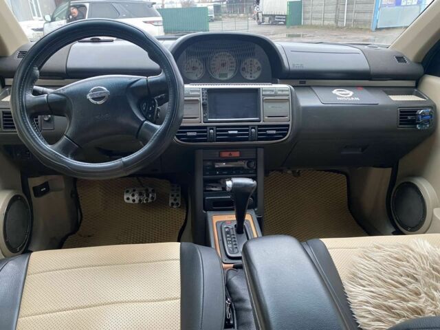 Серый Ниссан ИксТрейл, объемом двигателя 2 л и пробегом 330 тыс. км за 6000 $, фото 7 на Automoto.ua