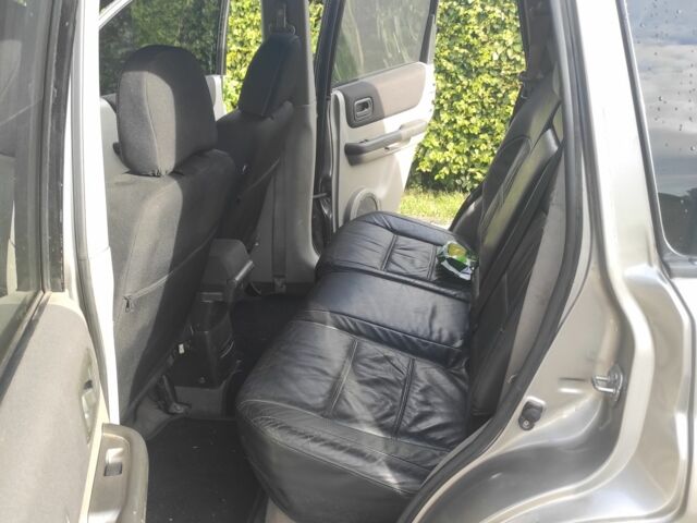 Серый Ниссан ИксТрейл, объемом двигателя 2.2 л и пробегом 323 тыс. км за 7100 $, фото 7 на Automoto.ua