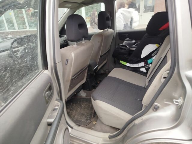 Серый Ниссан ИксТрейл, объемом двигателя 2.2 л и пробегом 193 тыс. км за 4000 $, фото 6 на Automoto.ua