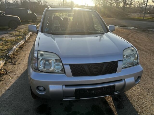 Сірий Ніссан ІксТрейл, об'ємом двигуна 2.2 л та пробігом 304 тис. км за 3569 $, фото 1 на Automoto.ua