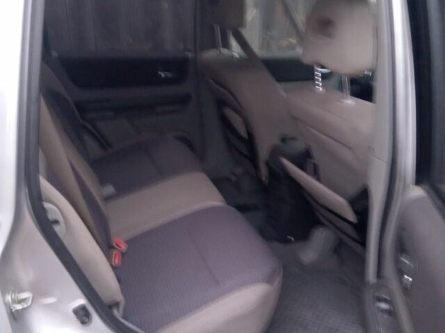 Сірий Ніссан ІксТрейл, об'ємом двигуна 2.2 л та пробігом 300 тис. км за 5000 $, фото 12 на Automoto.ua