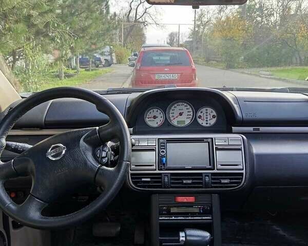 Серый Ниссан ИксТрейл, объемом двигателя 2 л и пробегом 231 тыс. км за 5300 $, фото 4 на Automoto.ua