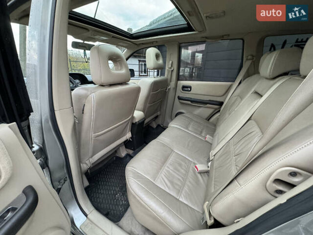 Серый Ниссан ИксТрейл, объемом двигателя 2 л и пробегом 249 тыс. км за 4999 $, фото 18 на Automoto.ua