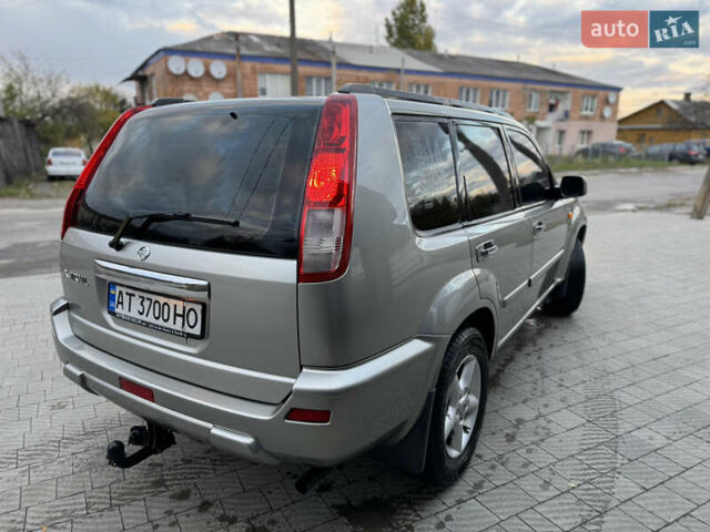 Серый Ниссан ИксТрейл, объемом двигателя 2 л и пробегом 249 тыс. км за 4999 $, фото 6 на Automoto.ua