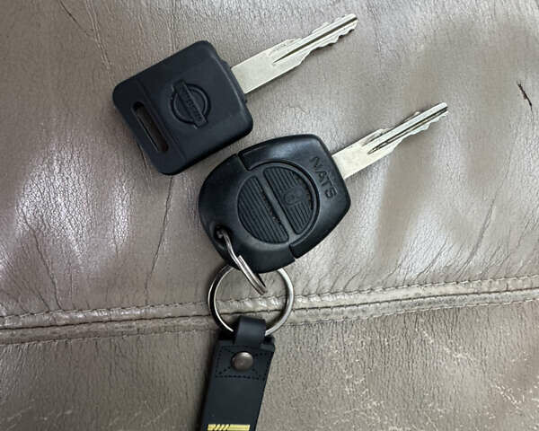 Серый Ниссан ИксТрейл, объемом двигателя 2 л и пробегом 249 тыс. км за 4999 $, фото 22 на Automoto.ua