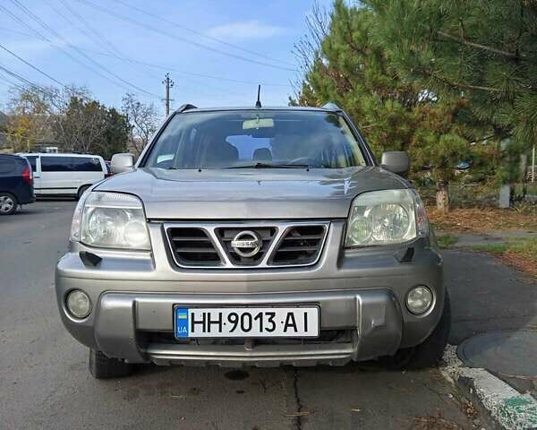 Серый Ниссан ИксТрейл, объемом двигателя 2 л и пробегом 231 тыс. км за 5300 $, фото 8 на Automoto.ua