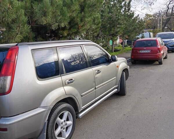 Серый Ниссан ИксТрейл, объемом двигателя 2 л и пробегом 231 тыс. км за 5300 $, фото 12 на Automoto.ua