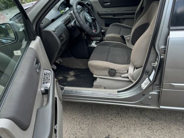 Серый Ниссан ИксТрейл, объемом двигателя 2.2 л и пробегом 265 тыс. км за 3550 $, фото 10 на Automoto.ua