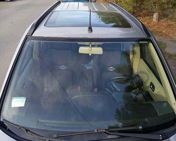 Серый Ниссан ИксТрейл, объемом двигателя 2 л и пробегом 231 тыс. км за 5300 $, фото 7 на Automoto.ua