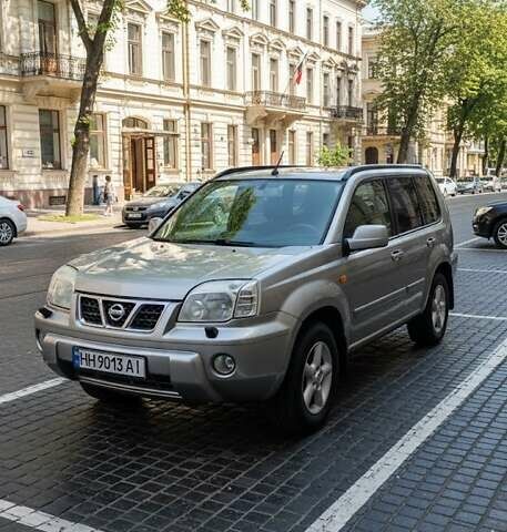 Серый Ниссан ИксТрейл, объемом двигателя 2 л и пробегом 231 тыс. км за 5300 $, фото 1 на Automoto.ua