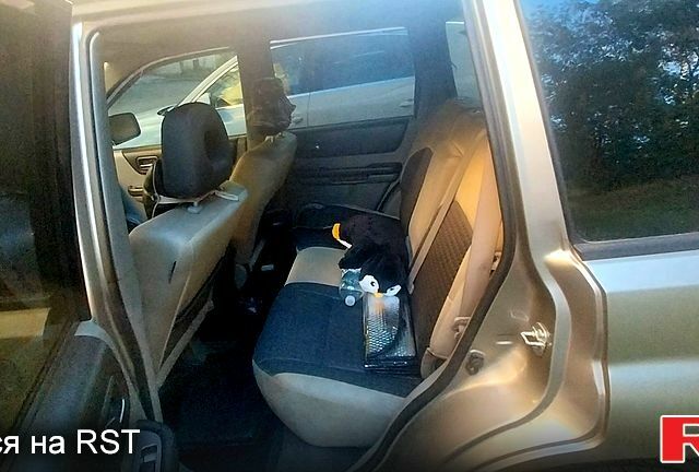 Серый Ниссан ИксТрейл, объемом двигателя 2.1 л и пробегом 119 тыс. км за 3500 $, фото 6 на Automoto.ua