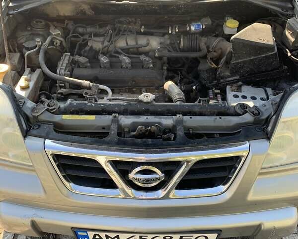 Сірий Ніссан ІксТрейл, об'ємом двигуна 2 л та пробігом 345 тис. км за 4700 $, фото 12 на Automoto.ua