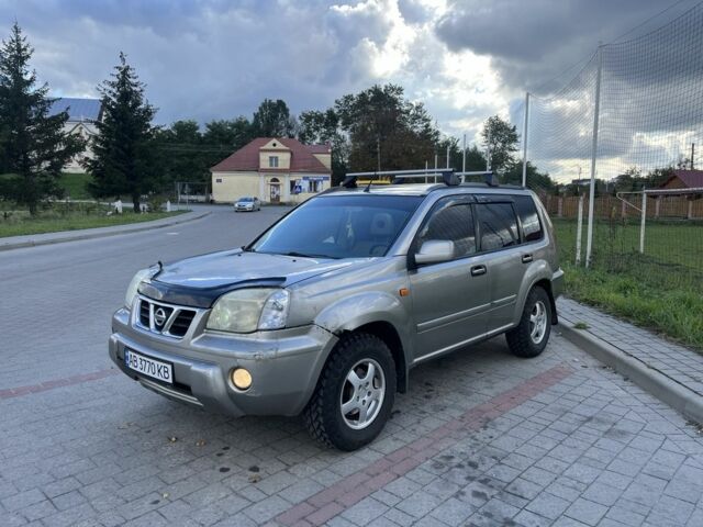 Серый Ниссан ИксТрейл, объемом двигателя 2.2 л и пробегом 340 тыс. км за 5000 $, фото 2 на Automoto.ua