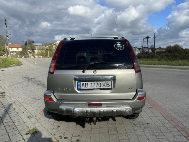 Серый Ниссан ИксТрейл, объемом двигателя 2.2 л и пробегом 340 тыс. км за 5000 $, фото 5 на Automoto.ua