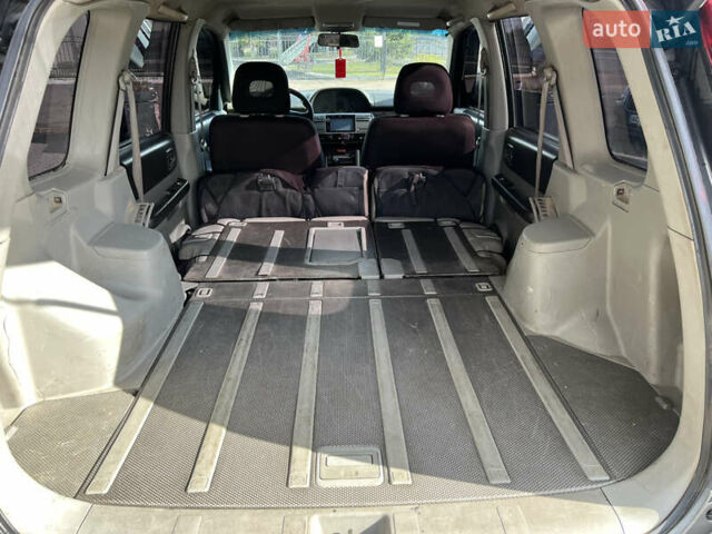 Серый Ниссан ИксТрейл, объемом двигателя 2.2 л и пробегом 468 тыс. км за 5500 $, фото 12 на Automoto.ua