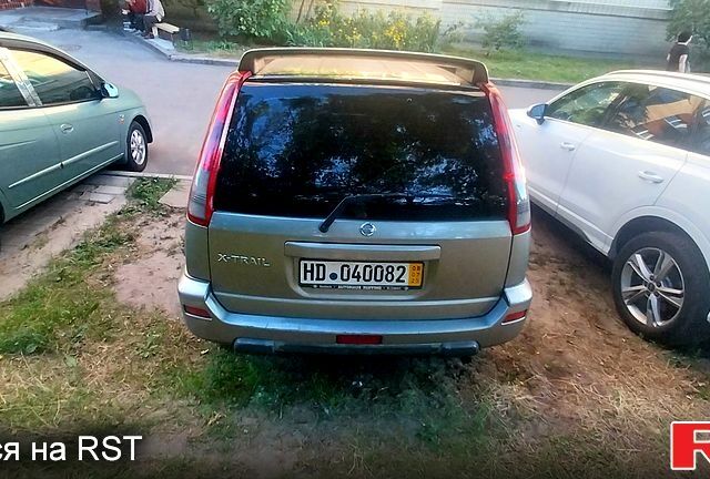 Серый Ниссан ИксТрейл, объемом двигателя 2.1 л и пробегом 119 тыс. км за 3500 $, фото 2 на Automoto.ua