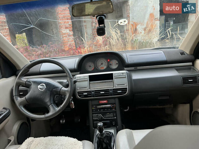 Серый Ниссан ИксТрейл, объемом двигателя 2.2 л и пробегом 401 тыс. км за 4400 $, фото 17 на Automoto.ua