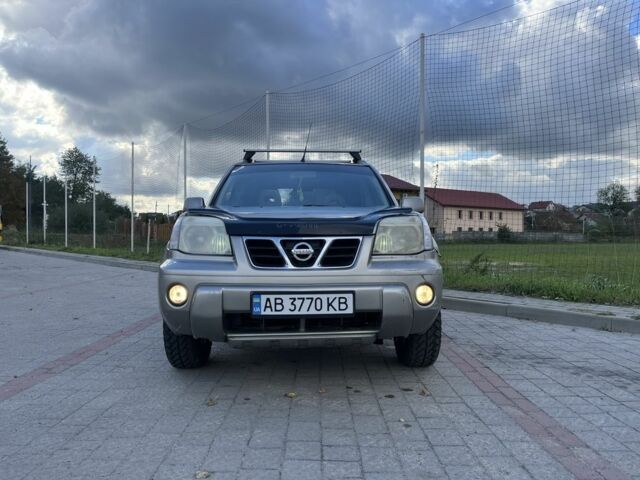 Серый Ниссан ИксТрейл, объемом двигателя 2.2 л и пробегом 340 тыс. км за 5000 $, фото 4 на Automoto.ua