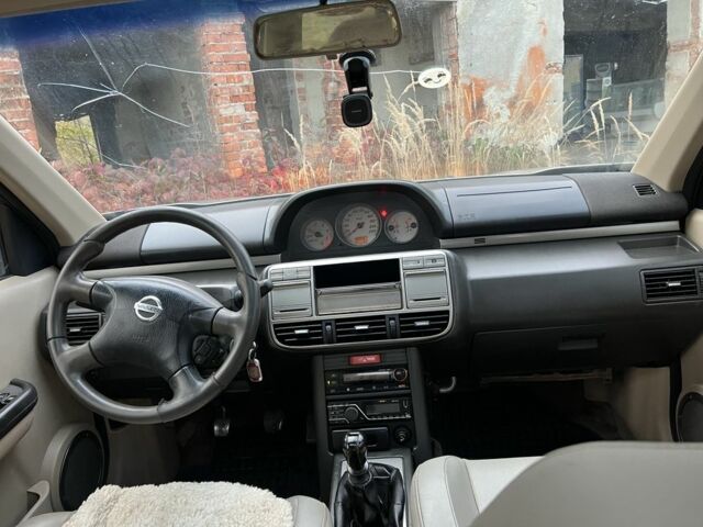 Серый Ниссан ИксТрейл, объемом двигателя 2.2 л и пробегом 400 тыс. км за 4400 $, фото 10 на Automoto.ua