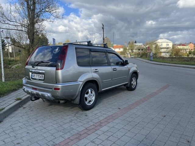 Серый Ниссан ИксТрейл, объемом двигателя 2.2 л и пробегом 340 тыс. км за 5000 $, фото 7 на Automoto.ua