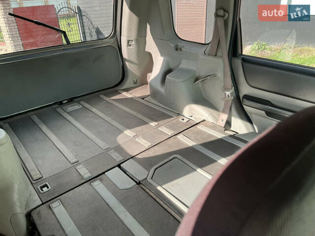 Серый Ниссан ИксТрейл, объемом двигателя 2.2 л и пробегом 468 тыс. км за 5500 $, фото 13 на Automoto.ua