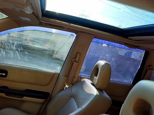 Сірий Ніссан ІксТрейл, об'ємом двигуна 2.5 л та пробігом 390 тис. км за 5000 $, фото 7 на Automoto.ua