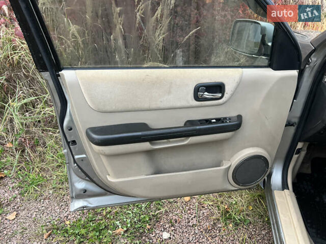 Серый Ниссан ИксТрейл, объемом двигателя 2.2 л и пробегом 401 тыс. км за 4400 $, фото 20 на Automoto.ua