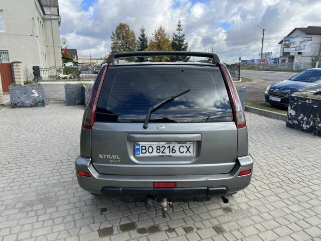 Серый Ниссан ИксТрейл, объемом двигателя 2.2 л и пробегом 468 тыс. км за 5500 $, фото 3 на Automoto.ua