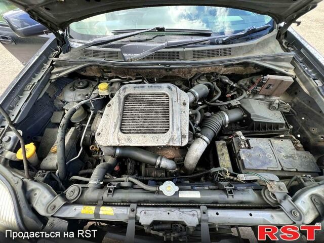 Серый Ниссан ИксТрейл, объемом двигателя 2.2 л и пробегом 218 тыс. км за 2800 $, фото 5 на Automoto.ua