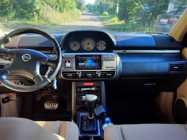 Сірий Ніссан ІксТрейл, об'ємом двигуна 2.5 л та пробігом 390 тис. км за 5000 $, фото 6 на Automoto.ua