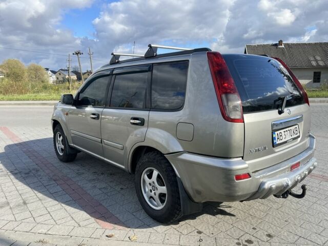 Серый Ниссан ИксТрейл, объемом двигателя 2.2 л и пробегом 340 тыс. км за 5000 $, фото 6 на Automoto.ua