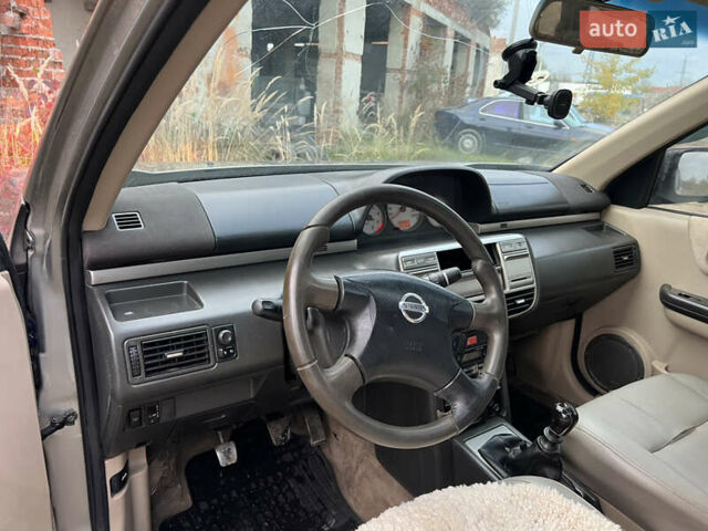 Серый Ниссан ИксТрейл, объемом двигателя 2.2 л и пробегом 401 тыс. км за 4400 $, фото 21 на Automoto.ua