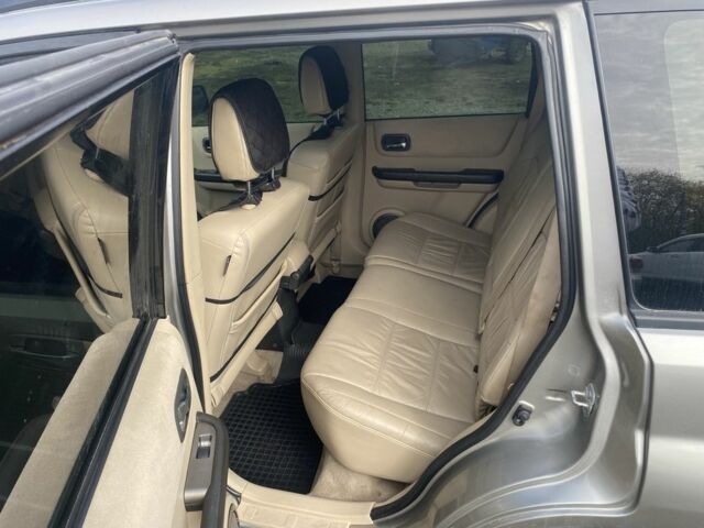 Серый Ниссан ИксТрейл, объемом двигателя 2 л и пробегом 200 тыс. км за 4950 $, фото 7 на Automoto.ua