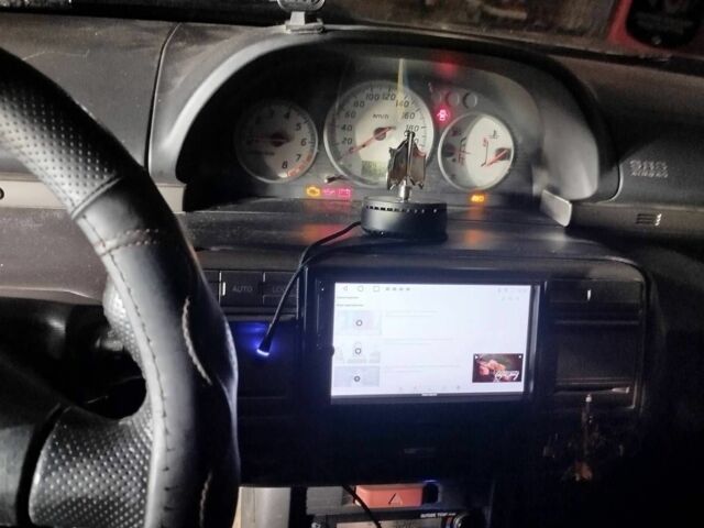 Серый Ниссан ИксТрейл, объемом двигателя 2 л и пробегом 260 тыс. км за 4000 $, фото 5 на Automoto.ua