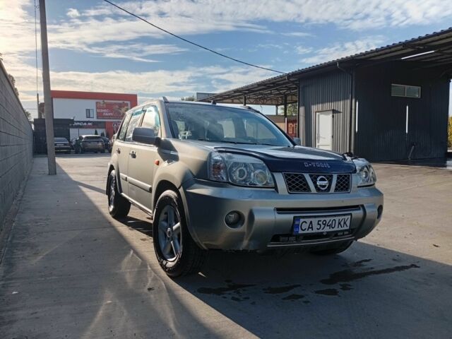 Сірий Ніссан ІксТрейл, об'ємом двигуна 2 л та пробігом 234 тис. км за 4100 $, фото 6 на Automoto.ua